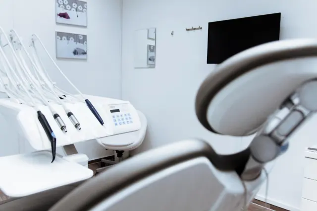 Clean treatment room with modern dental unit